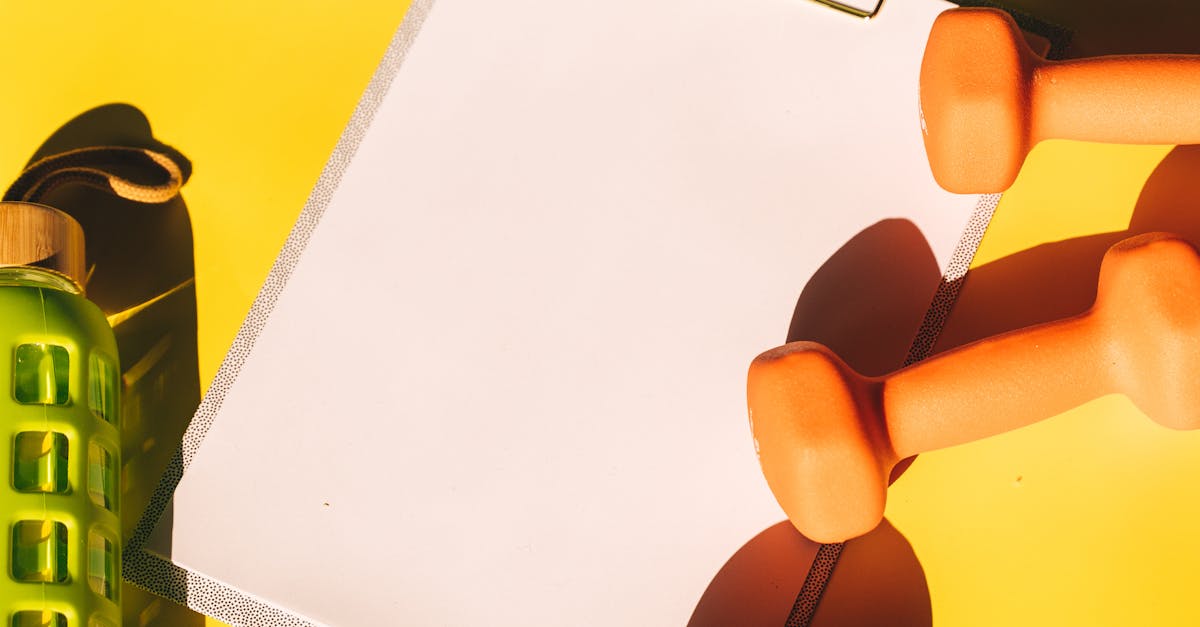 A flat lay of fitness equipment, fruits, and a clipboard on a vibrant yellow background. तीर्थ यात्रा के लिए स्वास्थ्य और फिटनेस टिप्स | Health and Fitness Tips for Pilgrimage in Hindi