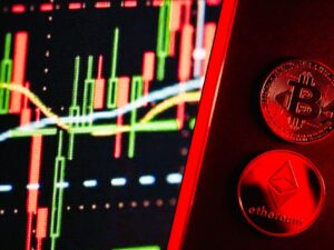 A vibrant image showcasing Bitcoin and Ethereum coins alongside a digital trading graph. 2026 में अपना पहला NFT कैसे बनाएं और बेचें? डिजिटल संपत्ति से कमाई की पूरी जानकारी