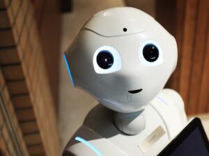 A futuristic humanoid robot in an indoor Tokyo setting, showcasing modern technology.