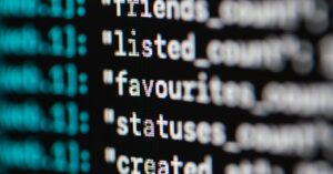 Extreme close-up of computer code displaying various programming terms and elements.