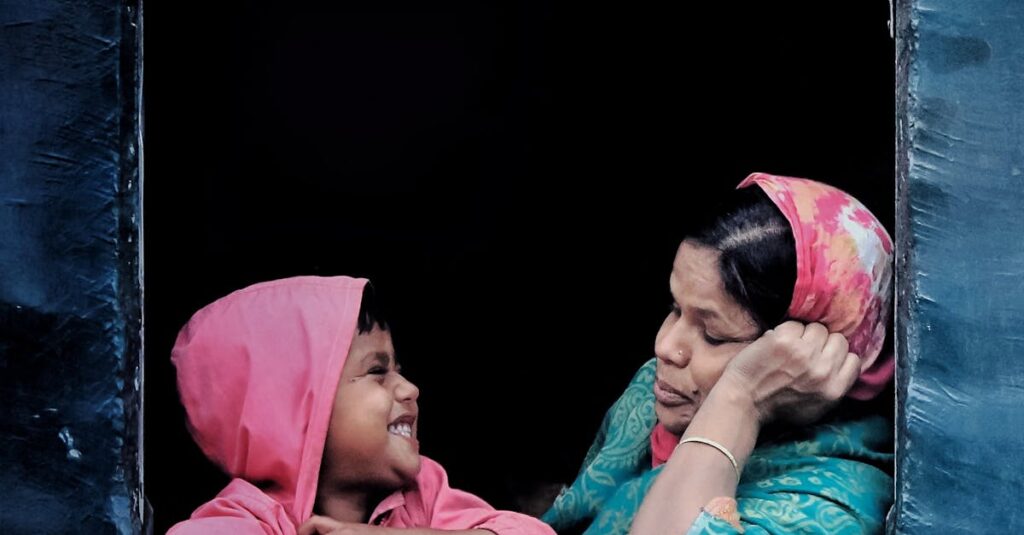 A touching moment of a mother and child sharing smiles through a train window, capturing warmth and connection.